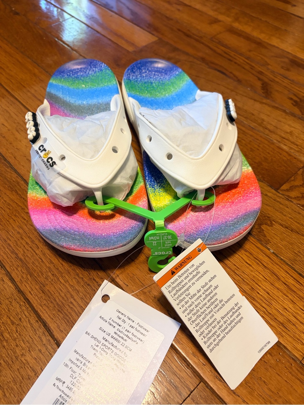 CROCS womens White Strap Rainbow Footbed Flip Sandals